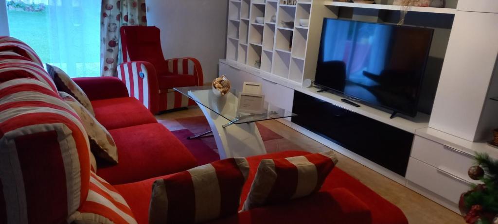 TV a/nebo společenská místnost v ubytování Casa Rotella
