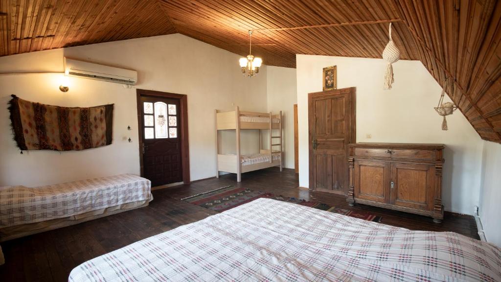Ένα ή περισσότερα κρεβάτια σε δωμάτιο στο vita campıng otel