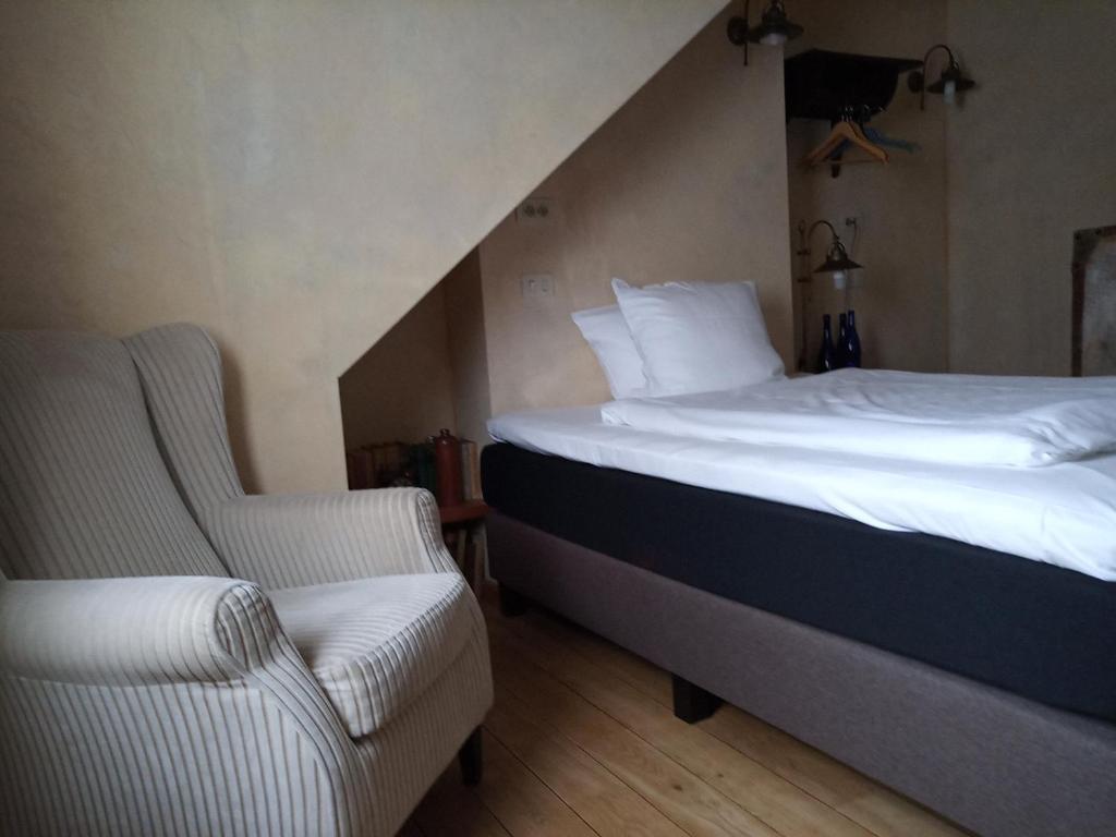 Postel nebo postele na pokoji v ubytování Focus Hotel