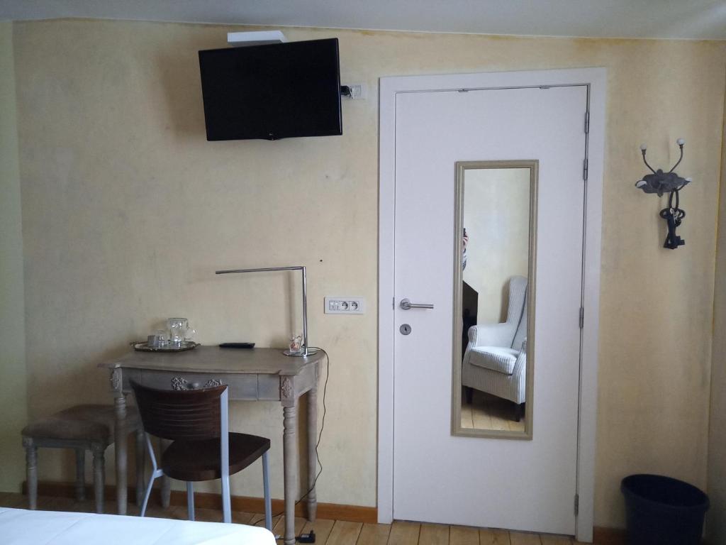 TV a/nebo společenská místnost v ubytování Focus Hotel