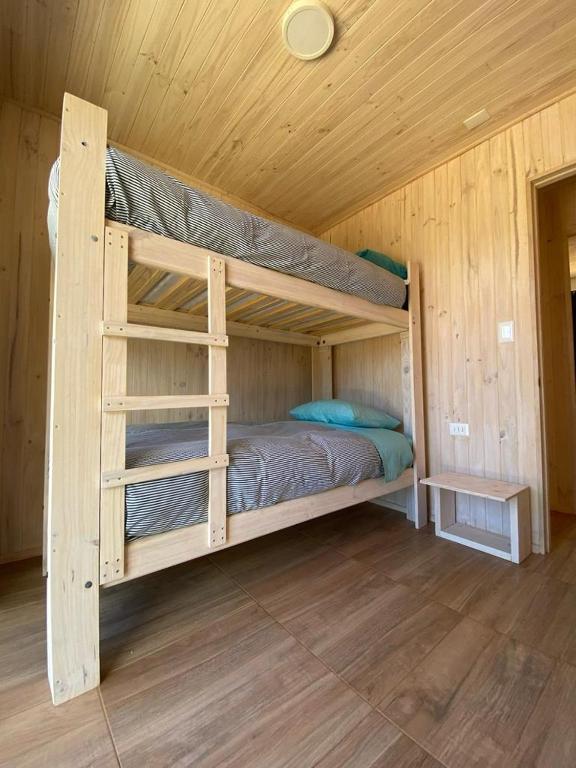 Postel nebo postele na pokoji v ubytování Cabaña gam.nav