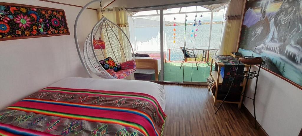 Postel nebo postele na pokoji v ubytování Uros Amaru Marka Lodge