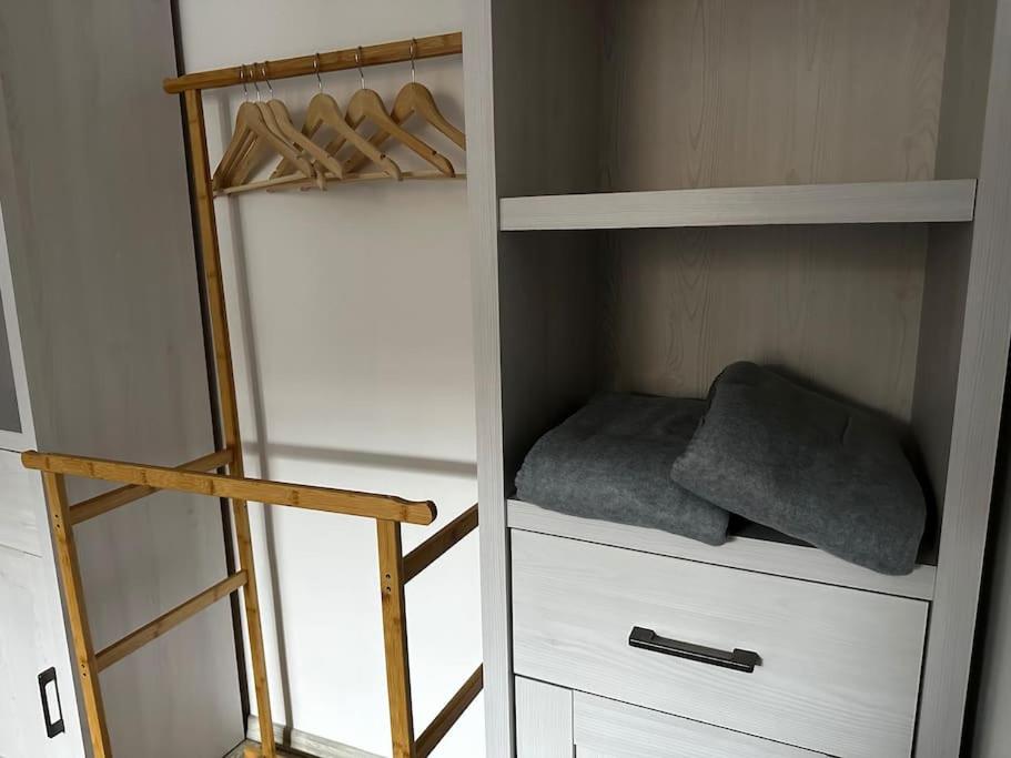 Postel nebo postele na pokoji v ubytování Byt v rezidenční čtvrti Prahy 6