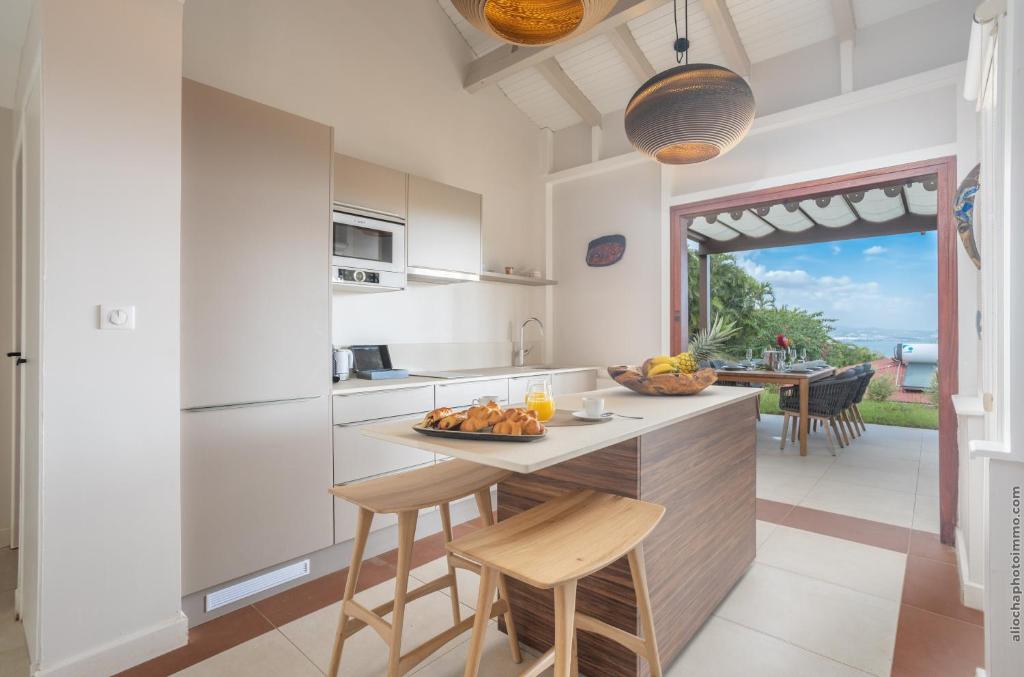 Kuchyň nebo kuchyňský kout v ubytování La Suite Villa