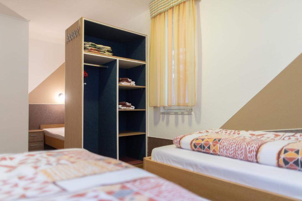 Postel nebo postele na pokoji v ubytování Ebermannsmühle