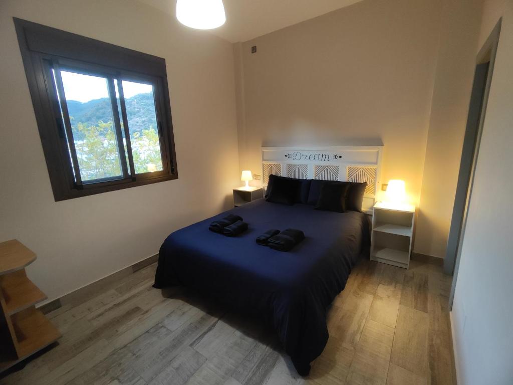 Posteľ alebo postele v izbe v ubytovaní Casa Rural Sierra De Las Nieves