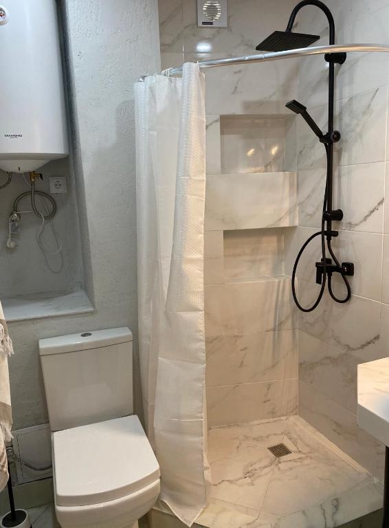 Koupelna v ubytování 2-room Apartment NFT Gudauri Penta 701