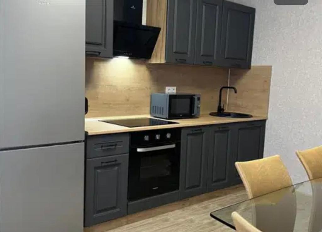 Kuchyň nebo kuchyňský kout v ubytování VIP apart 787