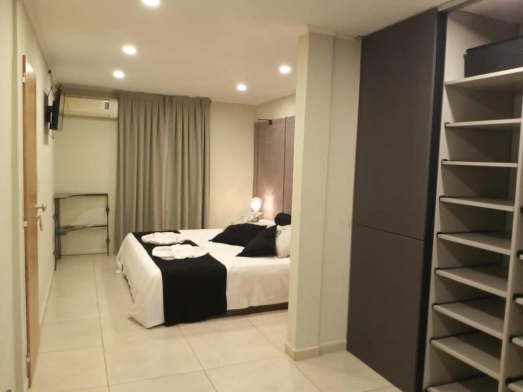 En eller flere senge i et værelse på Casa D a 2 - Jacuzzi - Parrilla - Centro de Federación