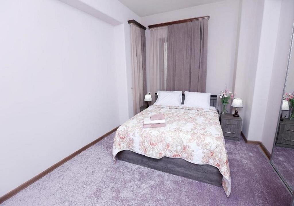 Postel nebo postele na pokoji v ubytování Yard Guesthouse