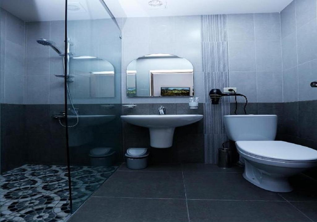 Koupelna v ubytování Yard Guesthouse