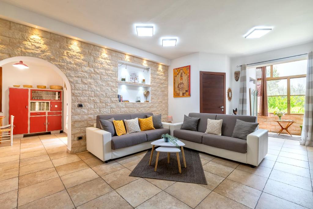 A seating area at Domo Anghèleda - Alghero casa indipendente vicino al mare