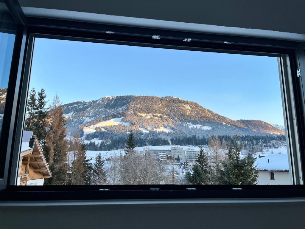 Nespecifikovaný výhled na hory nebo výhled na hory při pohledu z apartmánu