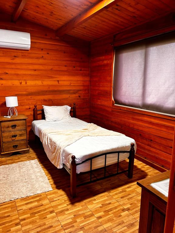 Postel nebo postele na pokoji v ubytování Vila Emigrante