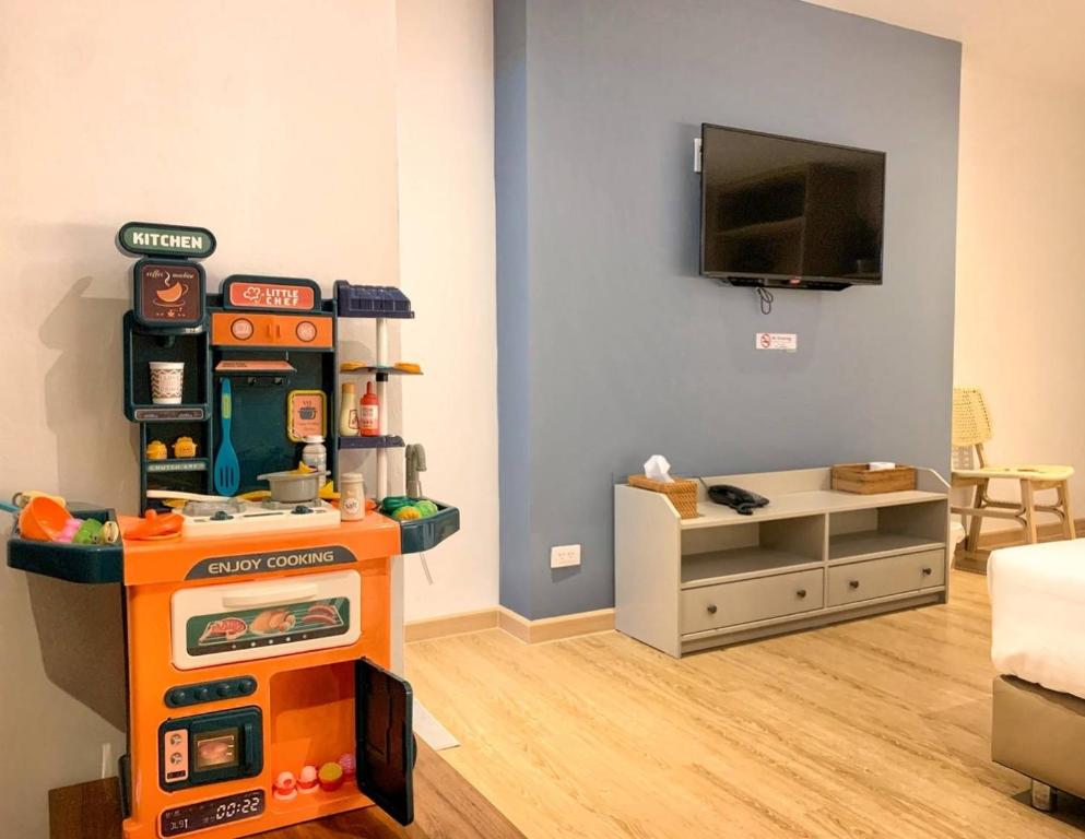TV a/nebo společenská místnost v ubytování Herma Hotel
