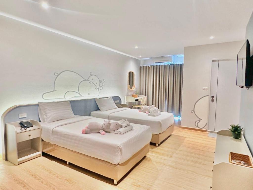 TV a/nebo společenská místnost v ubytování Herma Hotel