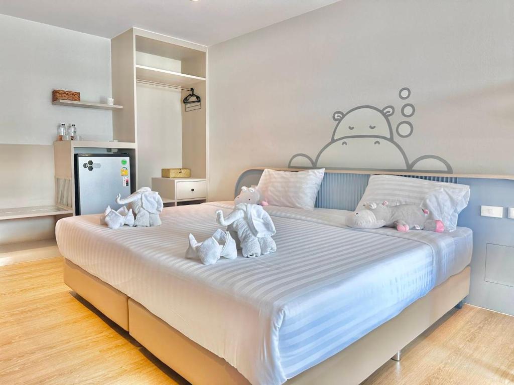 Postel nebo postele na pokoji v ubytování Herma Hotel