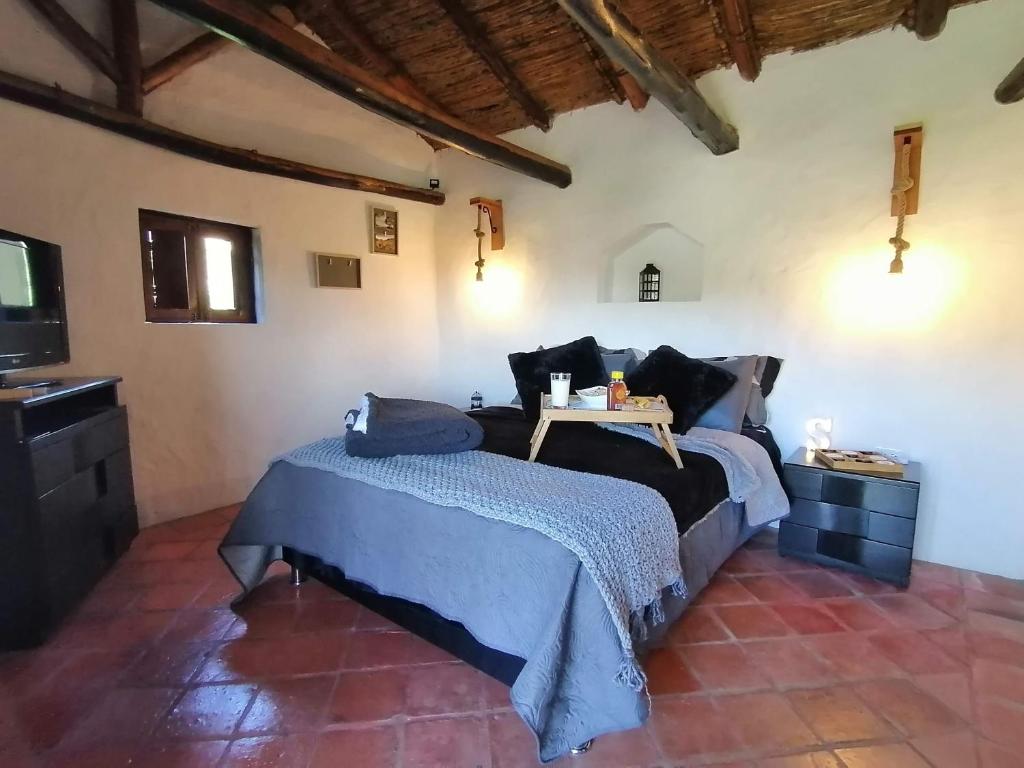 Katil atau katil-katil dalam bilik di Siskua Alojamiento rural