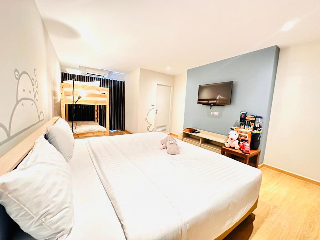 Postel nebo postele na pokoji v ubytování Herma Hotel