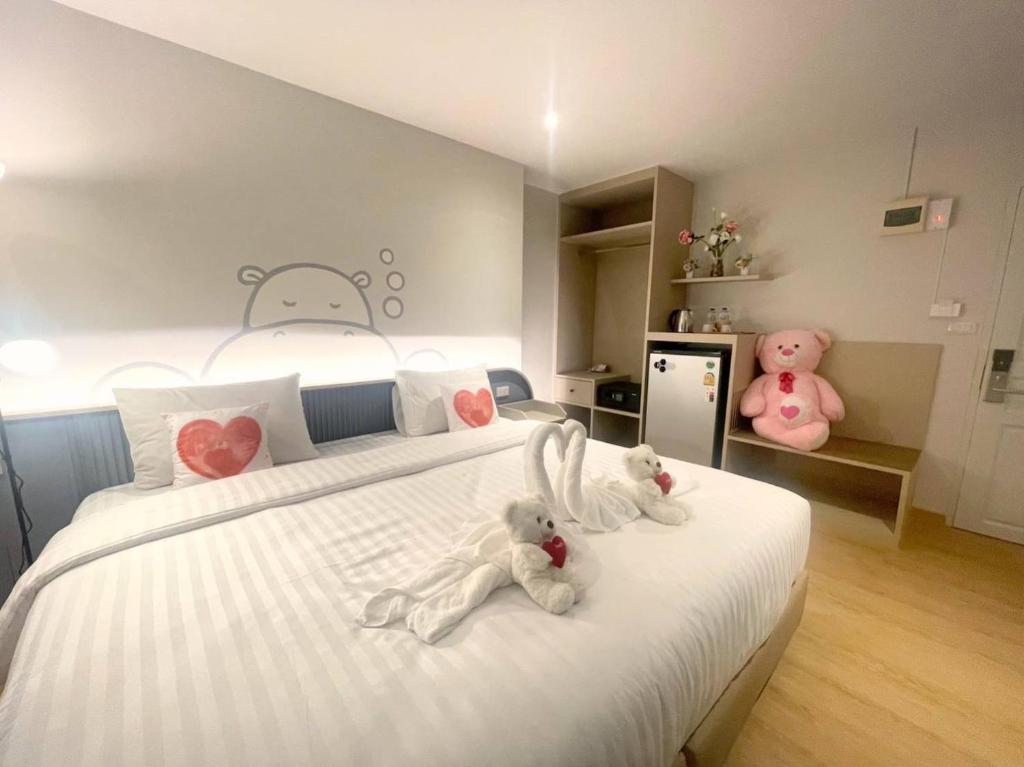 Postel nebo postele na pokoji v ubytování Herma Hotel