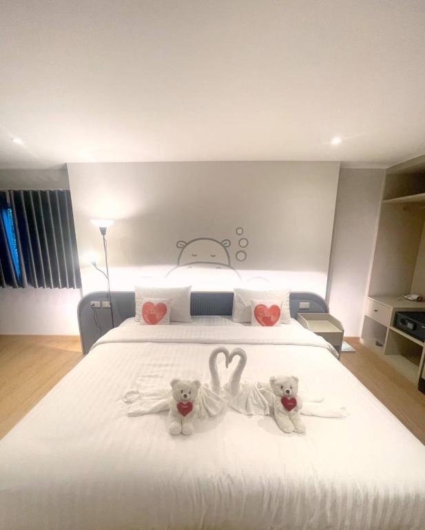 Postel nebo postele na pokoji v ubytování Herma Hotel