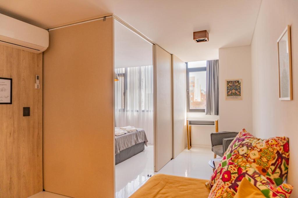 Postel nebo postele na pokoji v ubytování Neuquen Torre Eleganza