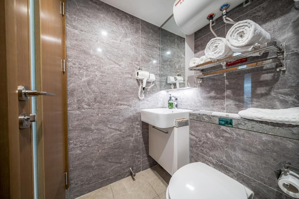 Koupelna v ubytování Gepai Executive Apartment - Shenzhen Futian Convention and Exhibition Center
