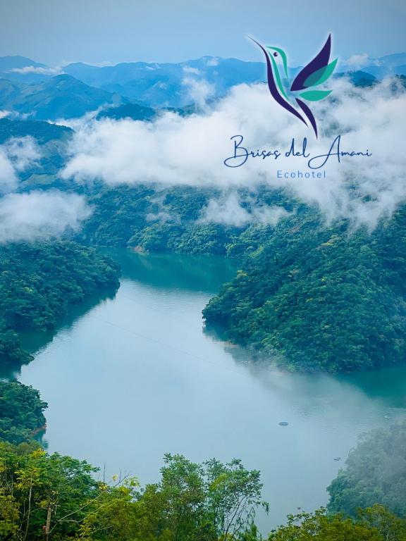 a picture of a lake in the clouds at EcoHotel Brisas del Amani in Norcasia