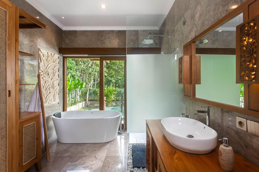 Koupelna v ubytování Arvanya Villa Ubud