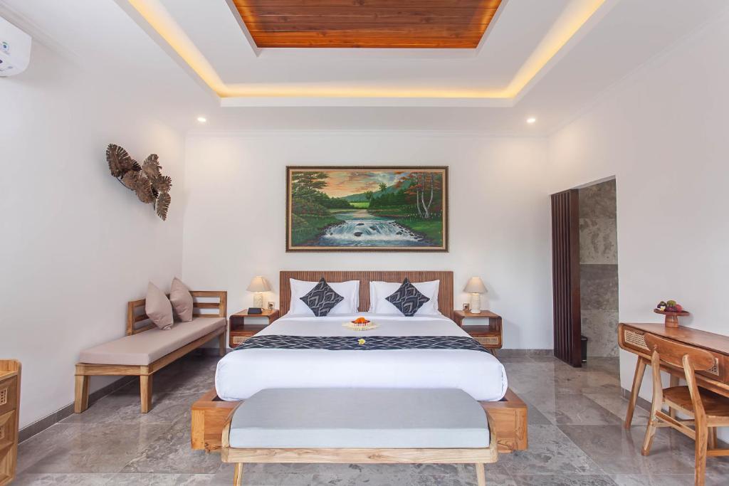 Postel nebo postele na pokoji v ubytování Arvanya Villa Ubud