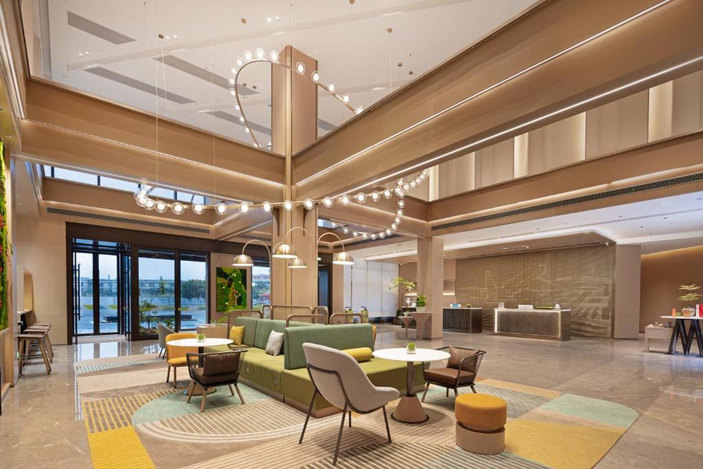 Posezení v ubytování Home2 Suites By Hilton Hotel Guangzhou Baiyun International Airport Branch - Free Shuttle Bus to Guangzhou Baiyun International Airport & Free Deliver Service to Canton Fair Complex During Canton Fair Period