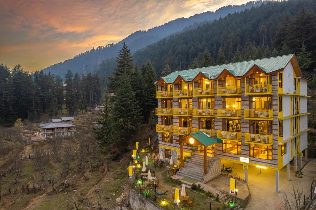 an aerial view of a hotel in the mountains at The Hosteller Manali, Old Manali in Manāli