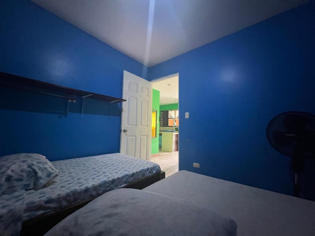 Postel nebo postele na pokoji v ubytování Las Casitas de Playa Ne gra