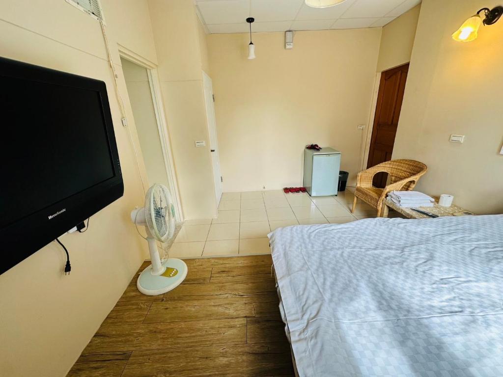 TV a/nebo společenská místnost v ubytování Zhixinyuan B&B