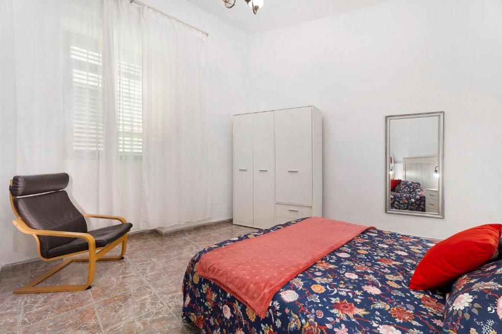 Postel nebo postele na pokoji v ubytování La Casa de Tina