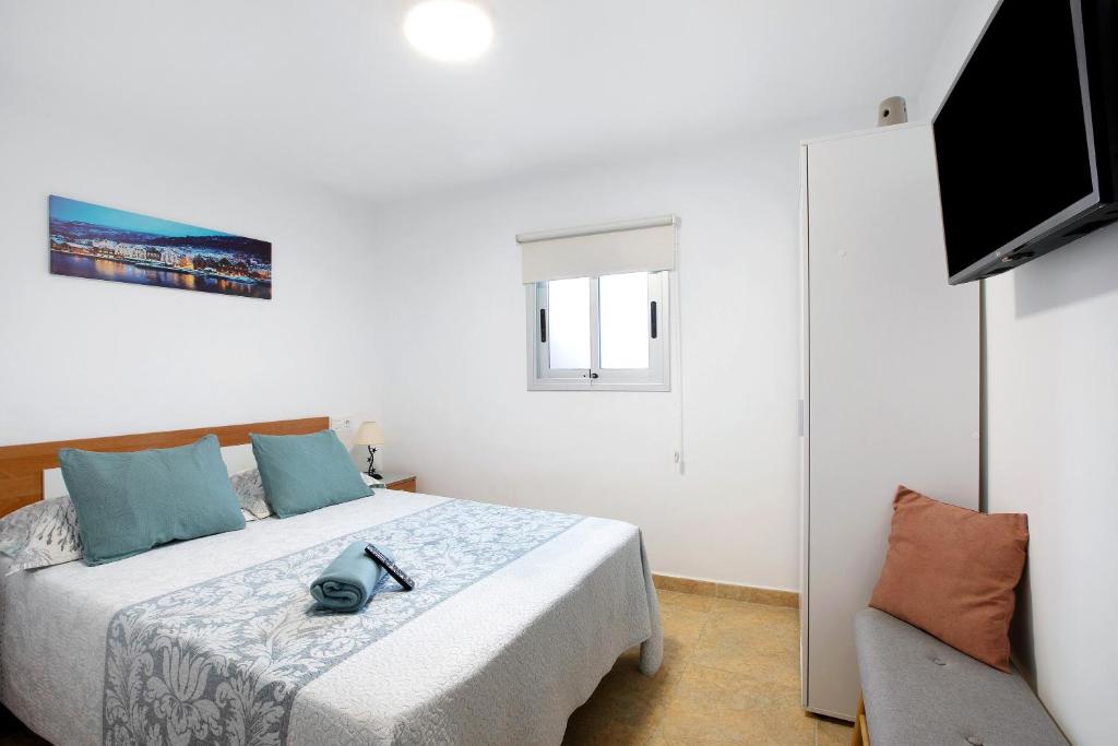 Postel nebo postele na pokoji v ubytování Apartamento La Morena 3a