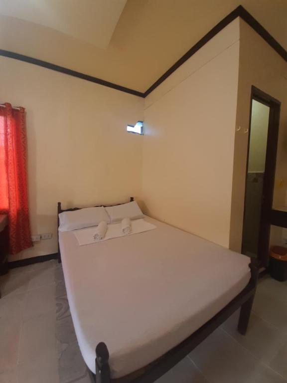 Postel nebo postele na pokoji v ubytování Subangan Room with Terrace 1