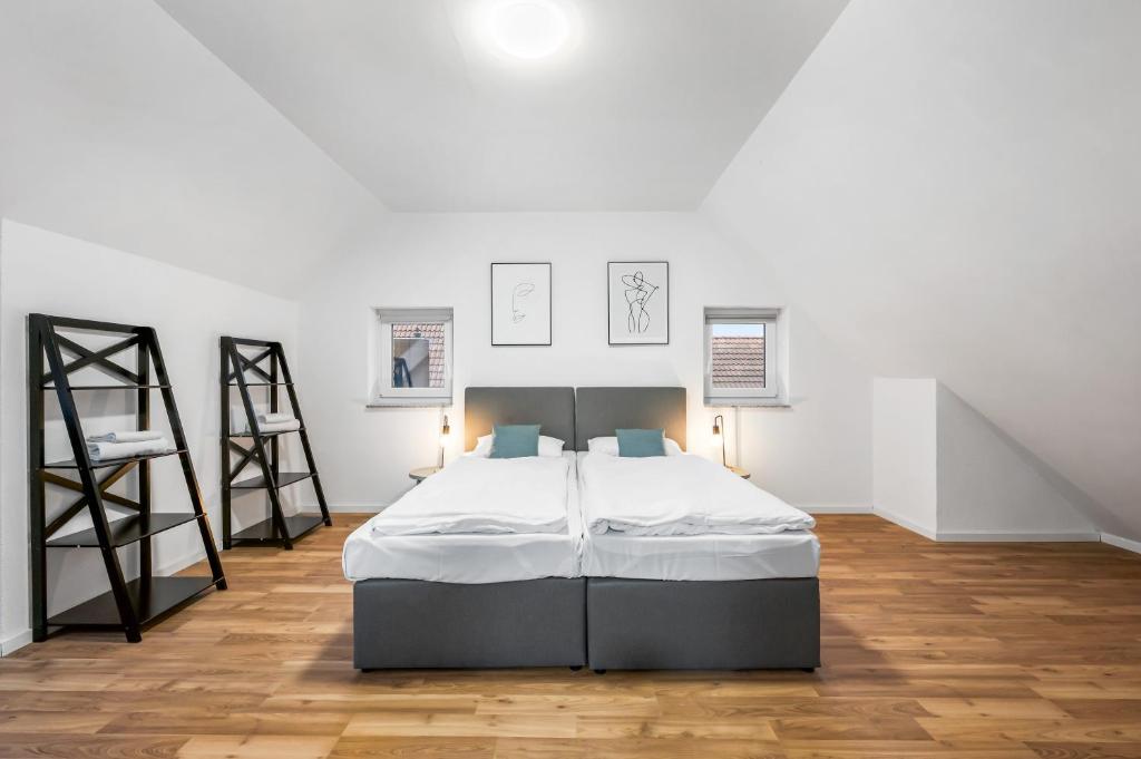 Postel nebo postele na pokoji v ubytování Sali Homes - Residenz zum Breitenauer See