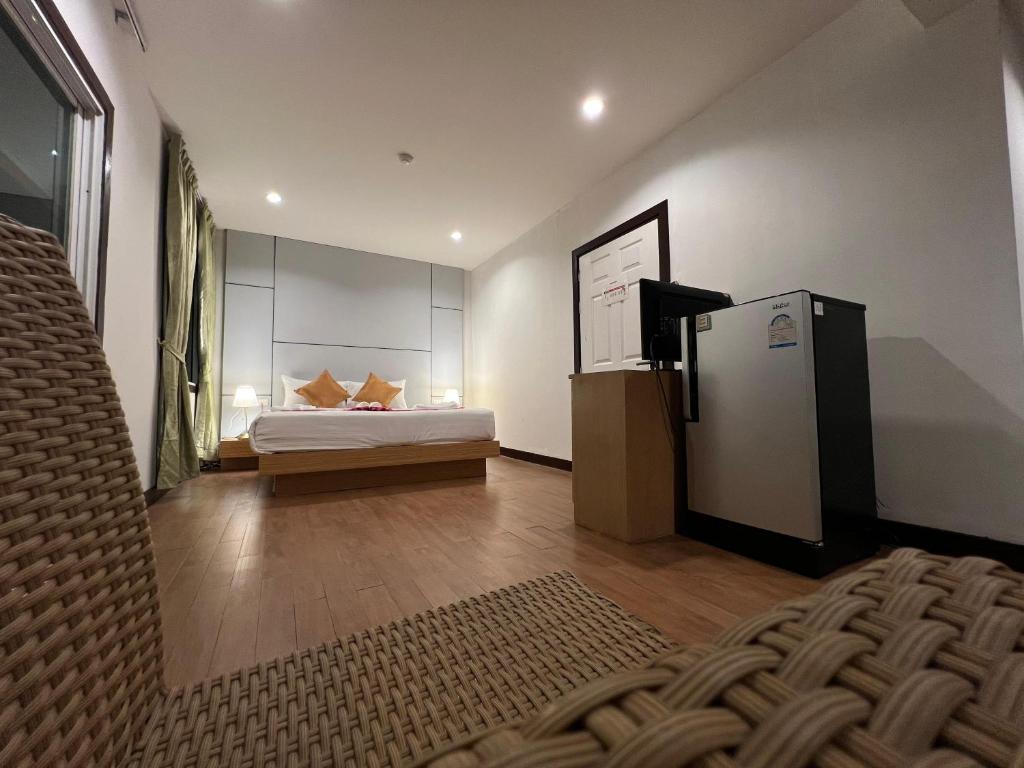 Postel nebo postele na pokoji v ubytování Zephyr Grand Hotel