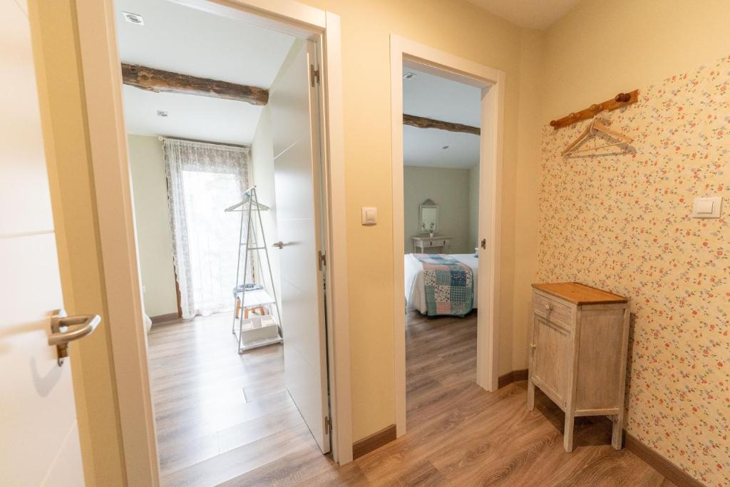 Postel nebo postele na pokoji v ubytování Casa rural MAZA especial grupos