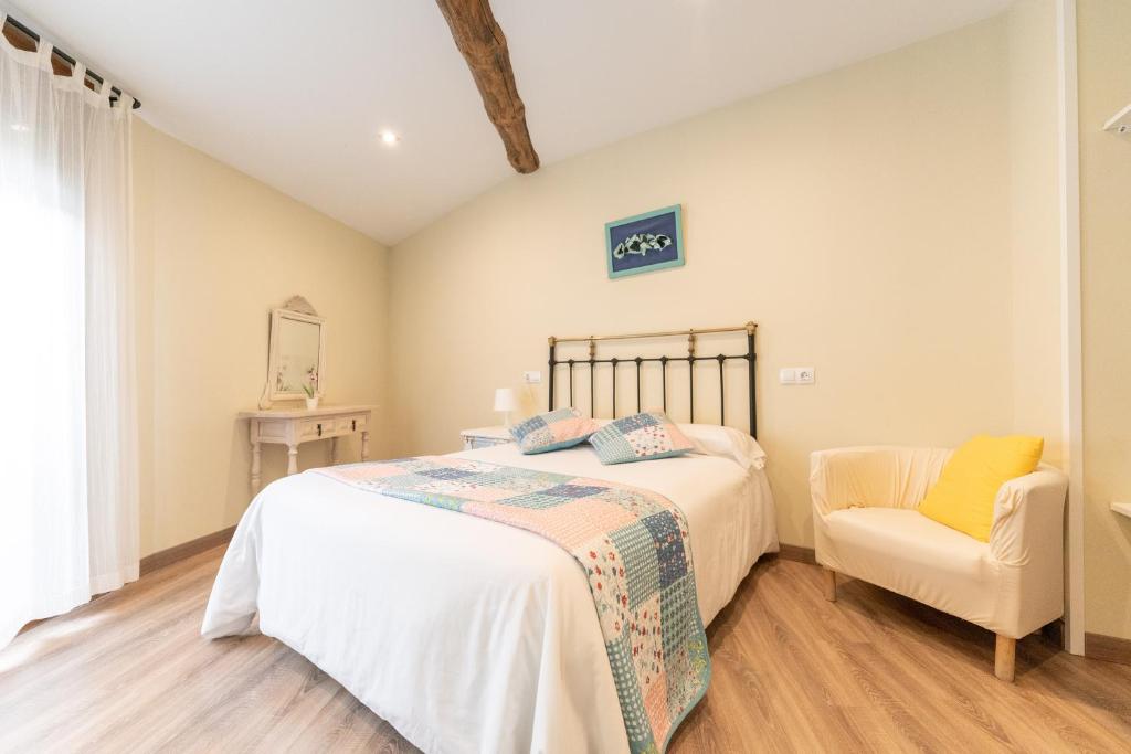 Postel nebo postele na pokoji v ubytování Casa rural MAZA especial grupos