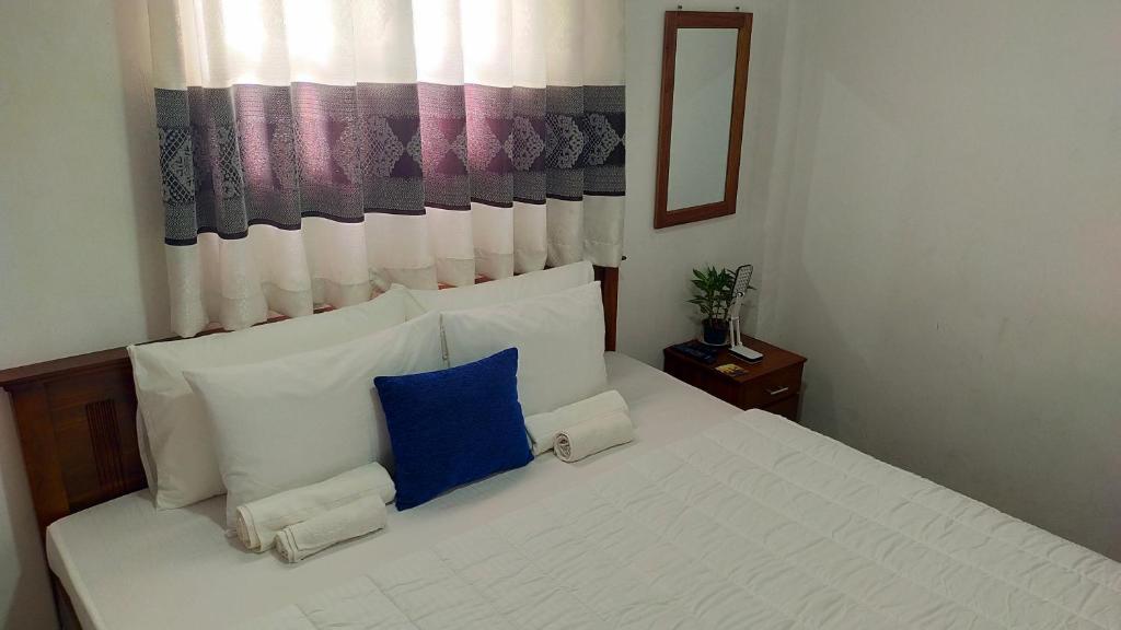 Voodi või voodid majutusasutuse SRI Home toas