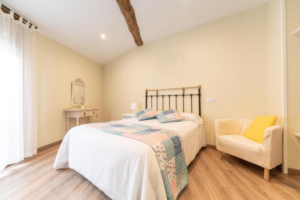 Postel nebo postele na pokoji v ubytování Casa rural MAZA especial grupos