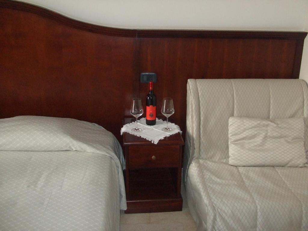Postel nebo postele na pokoji v ubytování Hotel Stella Del Sud