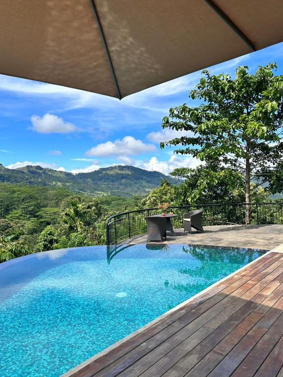Bazén v ubytování Kandy Dendrobium House nebo v jeho okolí