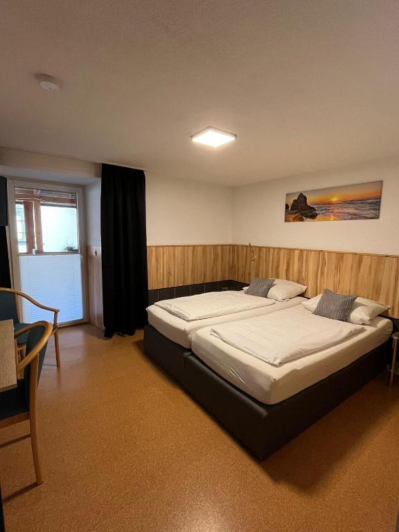 Postel nebo postele na pokoji v ubytování Pension Maintal Eltmann