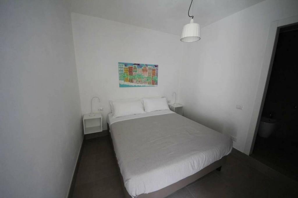Postel nebo postele na pokoji v ubytování RAL 7039