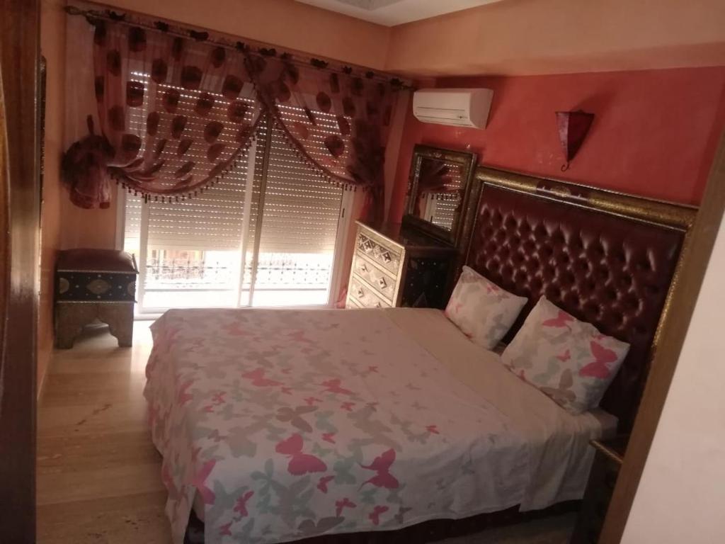 Postel nebo postele na pokoji v ubytování RESIDENCE HAMZA Cosy appartement only family à Gueliz