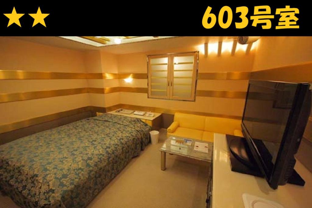 Postel nebo postele na pokoji v ubytování HOTEL Us Racecourse Adult only