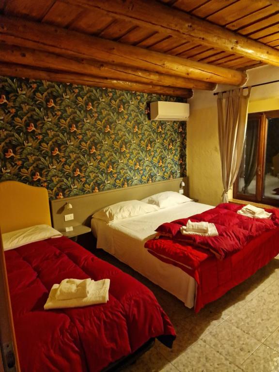 A bed or beds in a room at Locanda Al Centrale